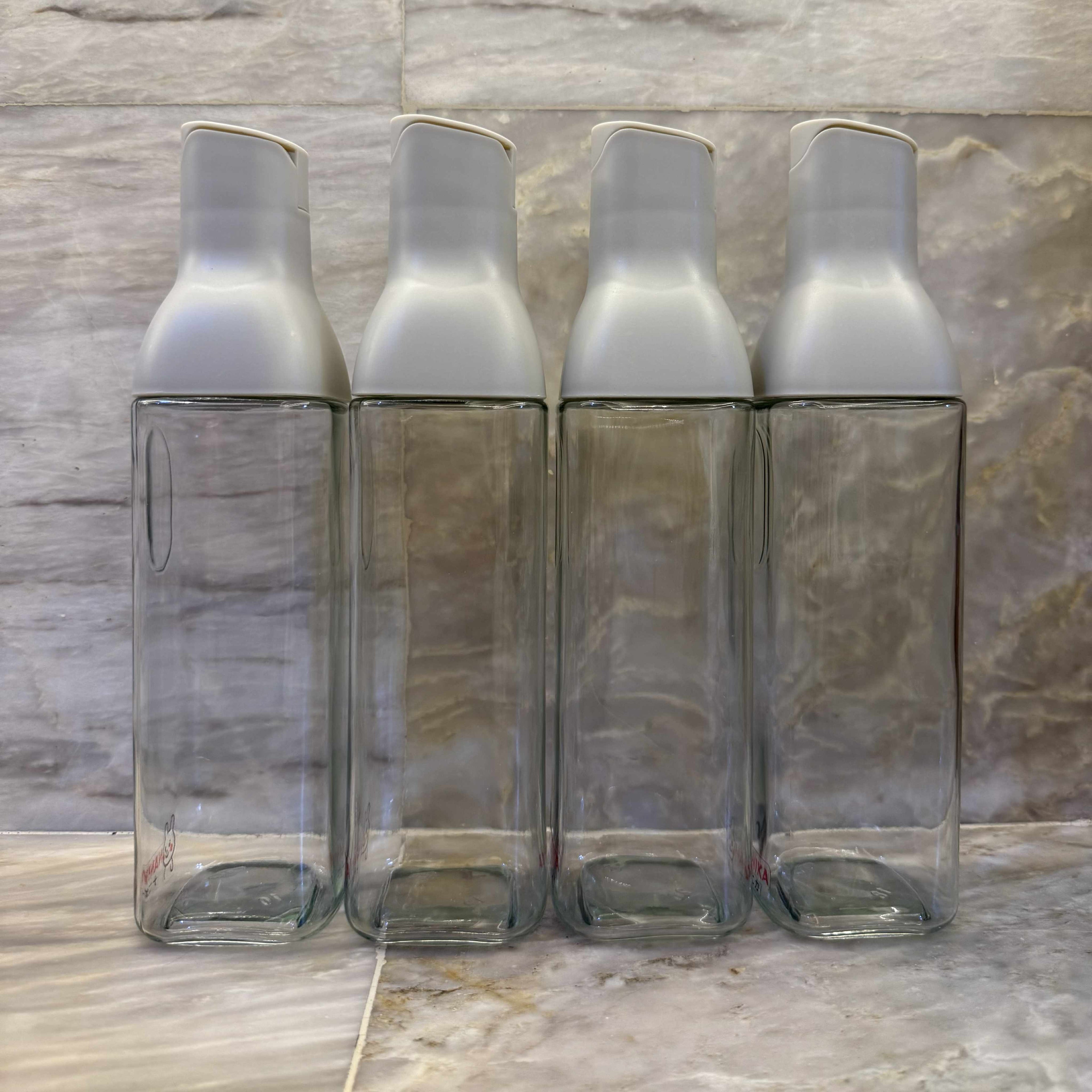 Non-spill glass bottle