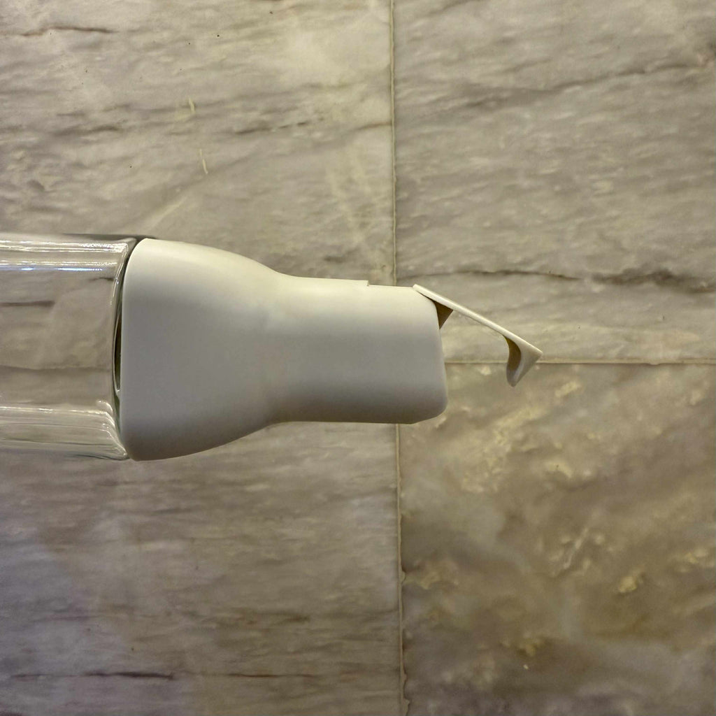 Non-spill glass bottle