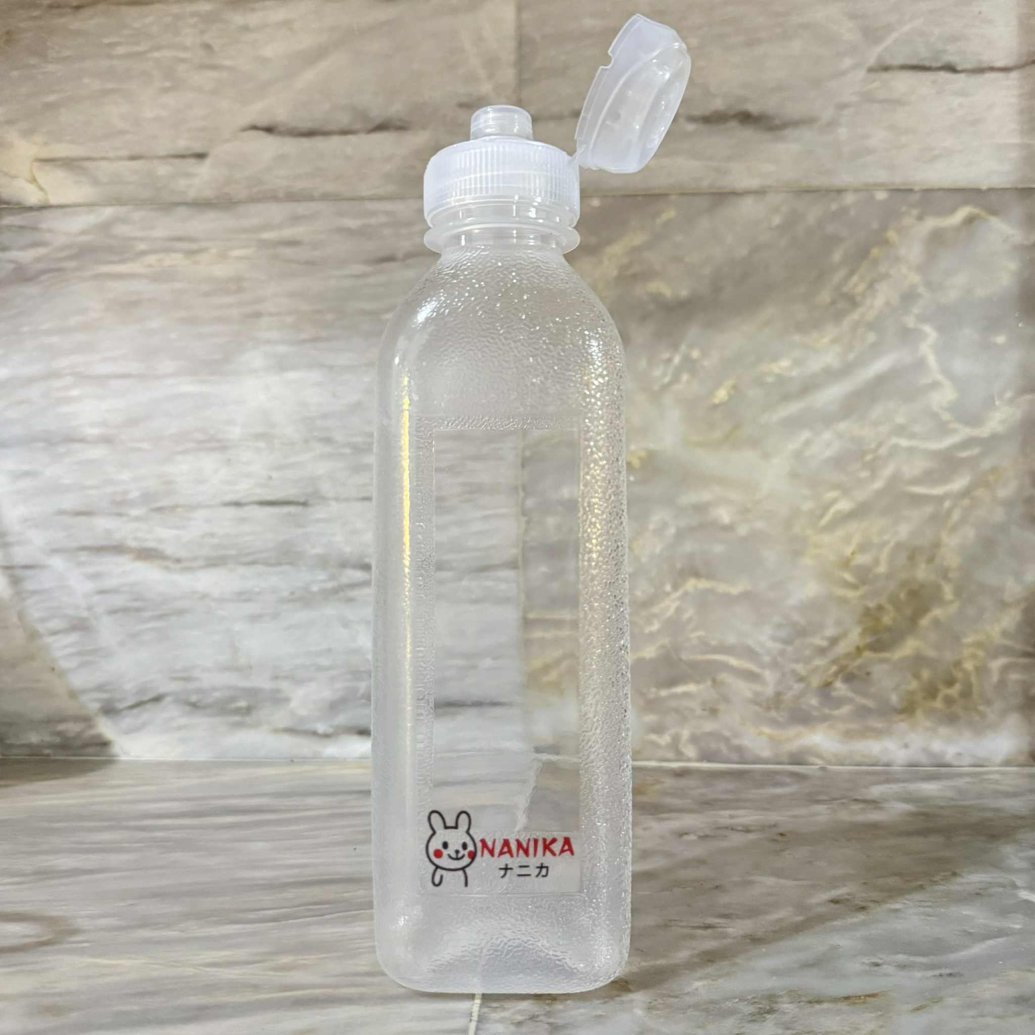 Non-spill plastic bottle