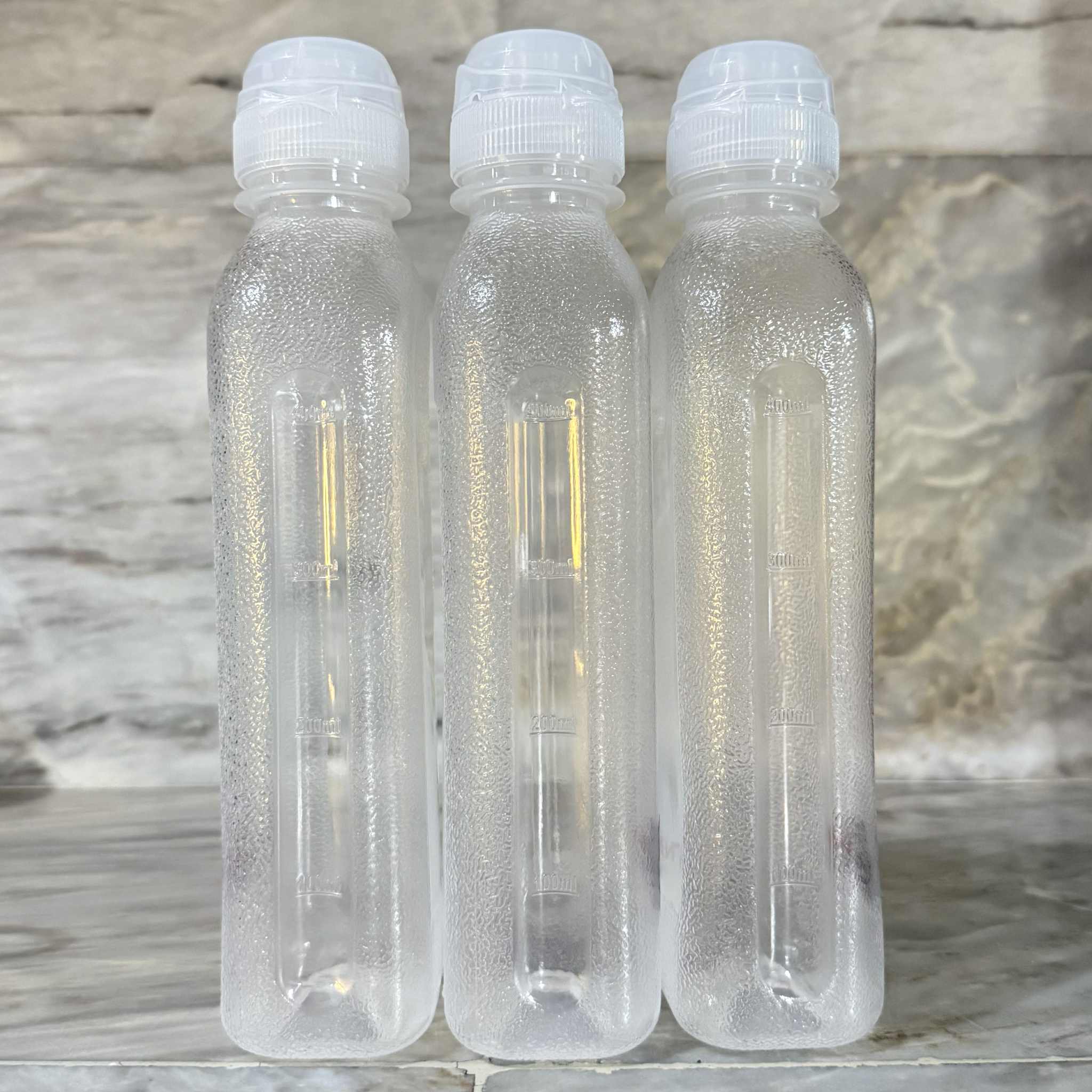 Non-spill plastic bottle